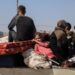 Warga Palestina membawa barang-barang mereka dan melarikan diri dari kawasan al-Tuffah di Gaza City timur pada 29 Juni 2025. (Xinhua/Rizek Abdeljawad)