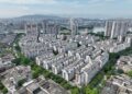 (250715) -- FUZHOU, July 15, 2025 (Xinhua) -- An aerial drone photo taken on July 13, 2025 shows the Cangxia New Town in Fuzhou, southeast China's Fujian Province.
  In recent years, Fuzhou has actively implemented renewal and upgrading programs for urban residential areas. Cangxia New Town, the formerly dilapidated area characterized by unpleasant living conditions in Fuzhou, has been transformed into a livable habitat after renovation and upgrading that started from July 2000 and lasted over a year. In September 2021, a new round of transforming and upgrading program was carried out here, with focus on the integration of historical culture and life convenience into the new town. Infrastructures for customized services have been built such as canteens for the elderly and daycare centers for the children. Through the urban area renewal, people's livelihood has been improved a lot. (Xinhua/Lin Shanchuan)