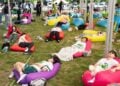 Para peserta berpartisipasi dalam kompetisi tidur di Seoul, Korea Selatan (Korsel), pada 18 Mei 2024. Sebuah kompetisi tidur diadakan di Taman Sungai Han Yeouido di Seoul pada Sabtu (18/5) untuk membantu warga bersantai dan merasakan asyiknya tidur siang di luar ruangan. (Xinhua/Yao Qilin)