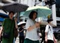 Orang-orang melintas di sebuah jalan di Tokyo, Jepang, pada 4 Juli 2024.. (Xinhua/Zhang Xiaoyu)